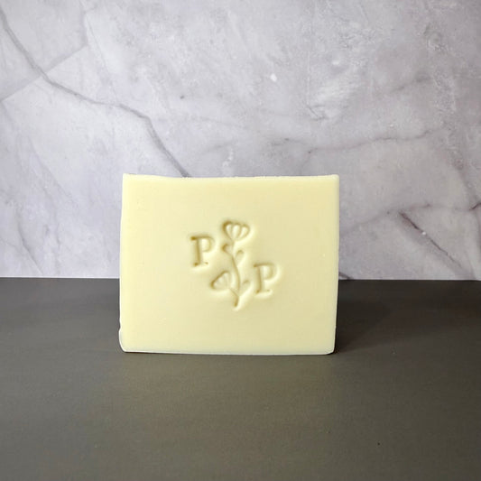 Handcrafted soap bar named Aloe Essence, natural uncolored bar made with aloe, smooth matte finish, fragrance-free