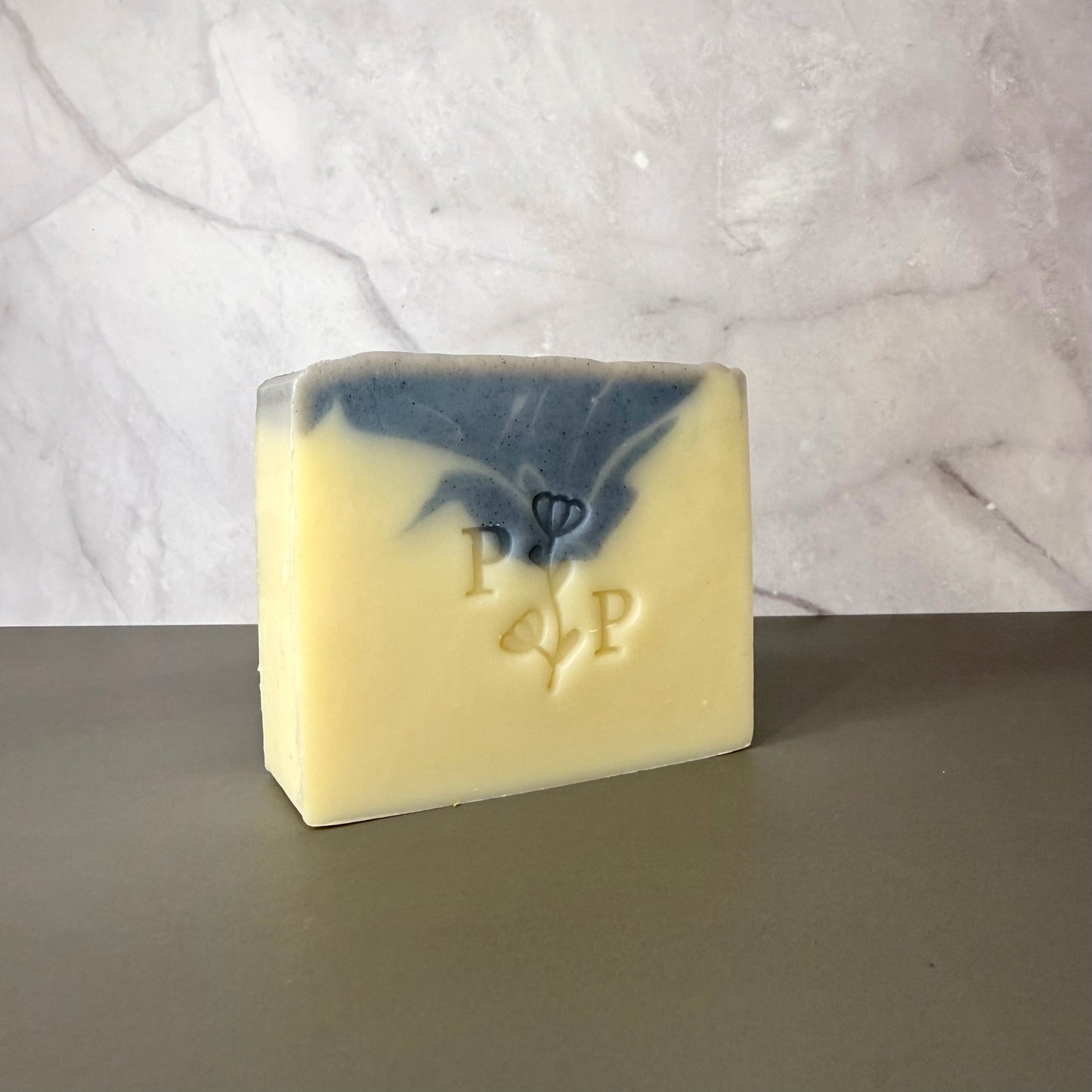 Handcrafted soap bar named Blue Moon, soft blue bar colored with butterfly pea flower, fragrance-free