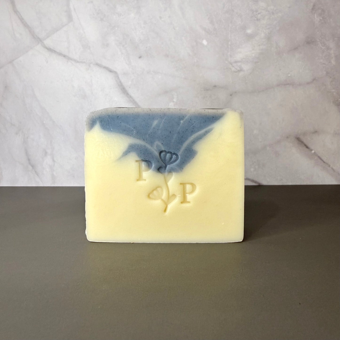 Handcrafted soap bar named Blue Moon, soft blue bar colored with butterfly pea flower, fragrance-free
