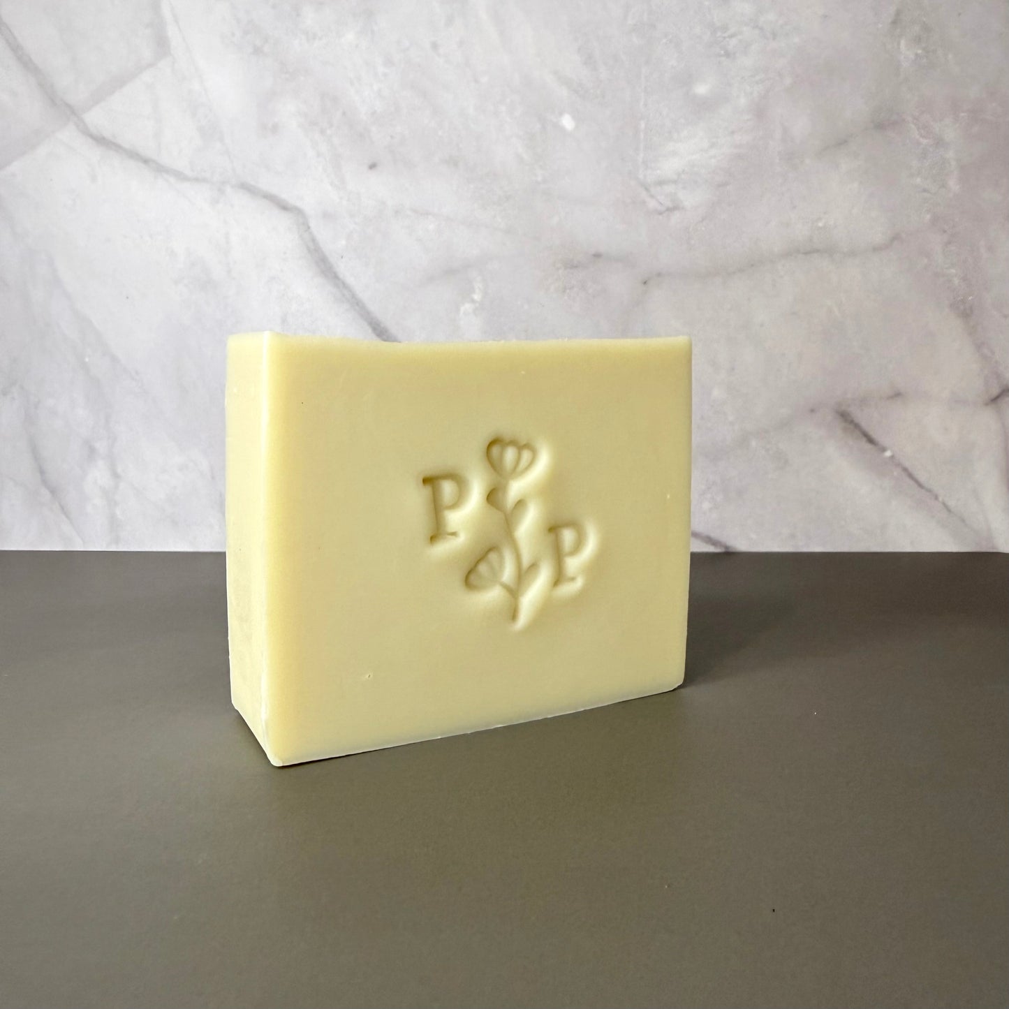 Handcrafted soap bar named Aloe Essence, natural uncolored bar made with aloe, smooth matte finish, fragrance-free